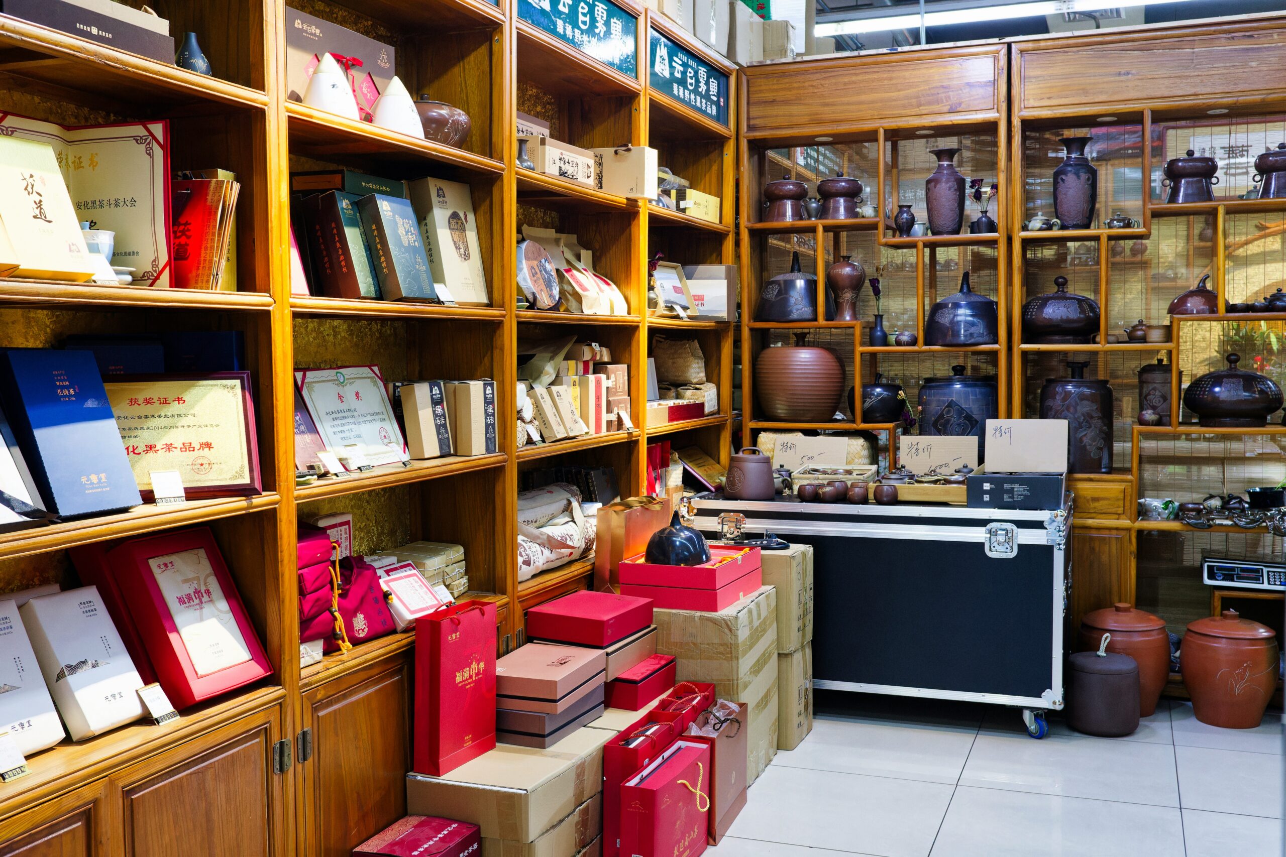 A room filled with lots of shelves filled with books